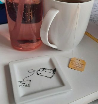 Teetasse und Getränk